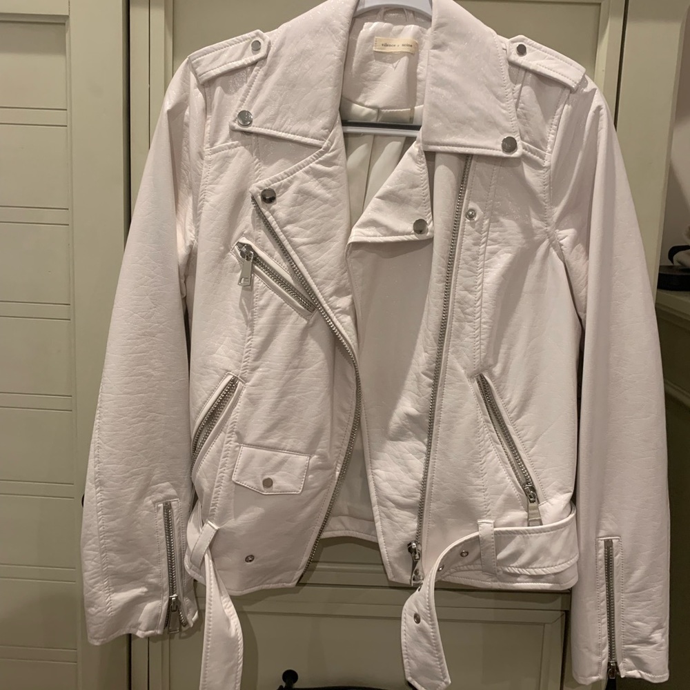 White faux leather jacket.